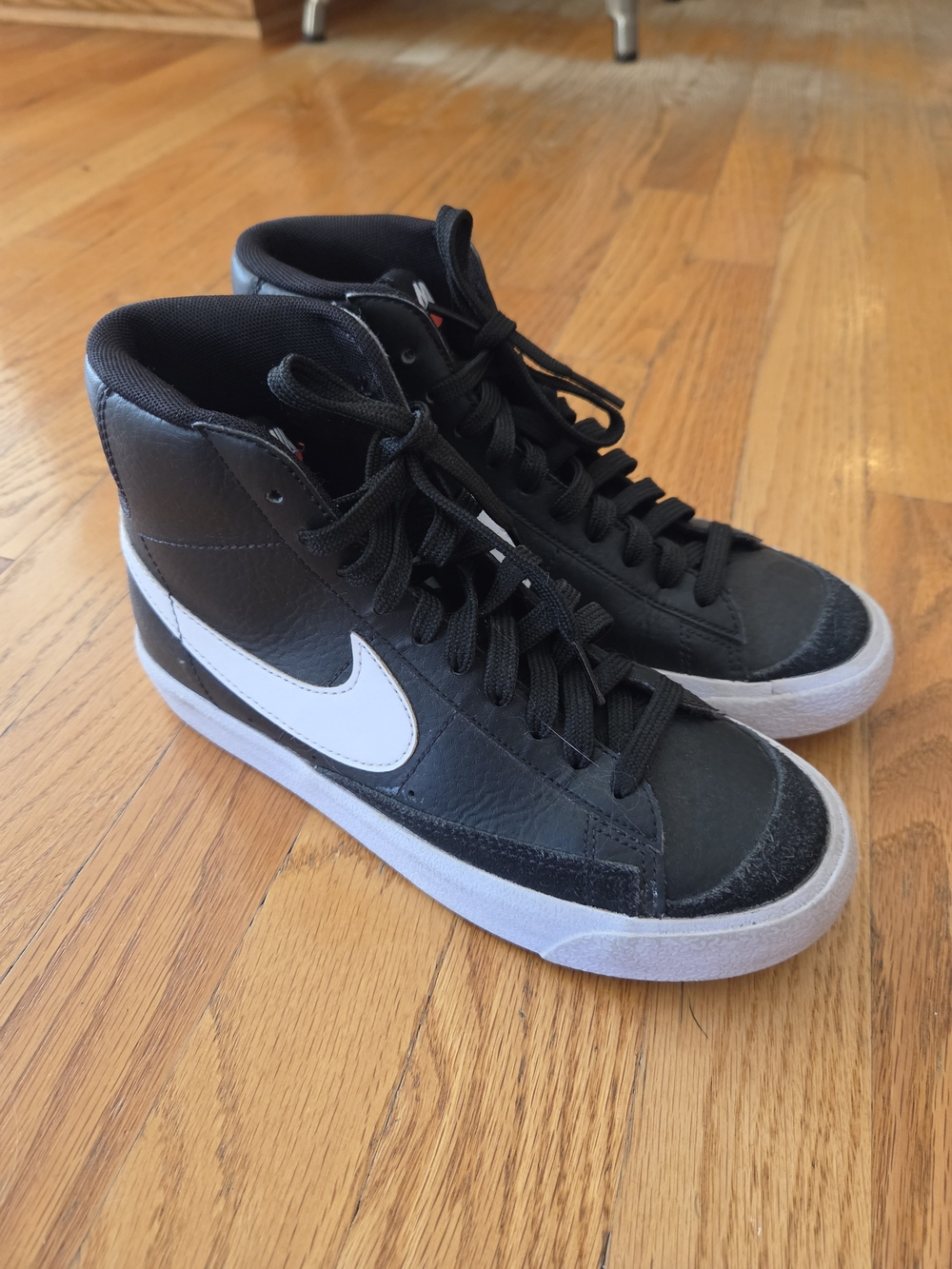 Nike Black High-Top Sneakers with White Swoosh